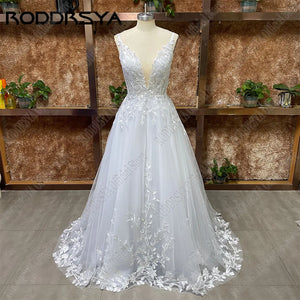 RODDRSYA Spaghetti Straps Glitter Wedding Dresses V-Neck Shiny Tulle With Applique Backless Bohemia Lace Bridal Gowns Plus Size